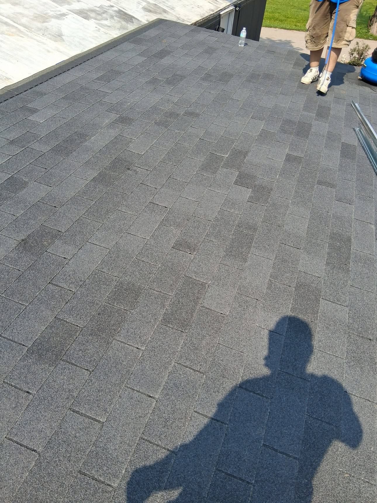 Completed asphalt shingle roof work